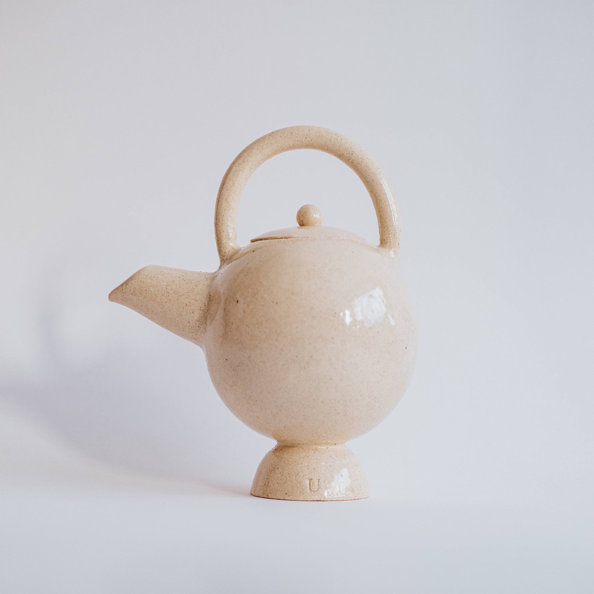Handmade white ceramic teapot from the Hourglass Collection by Ursula Ceramica, crafted in Portugal with an elegant minimalist design